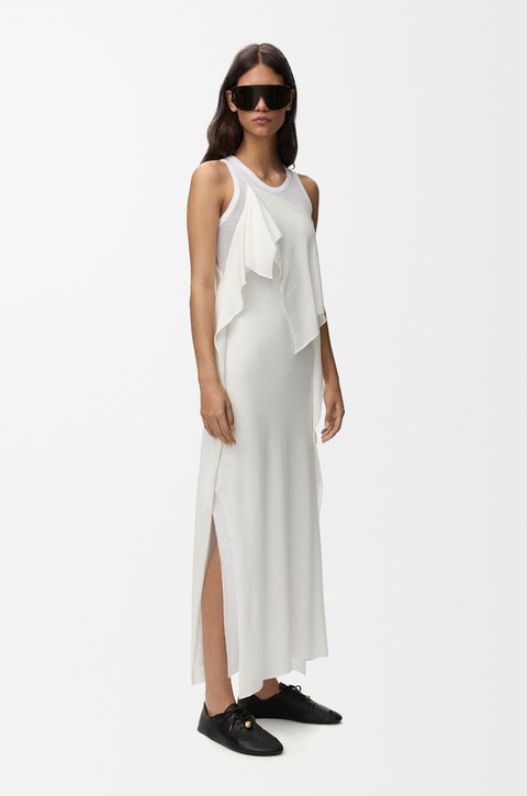 Sculptural Ease style inspiration: Fluid draping. Quiet impact.